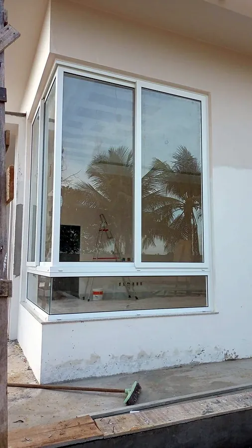 Retail storefront on Tariq Road Karachi with uPVC entrance doors and display windows